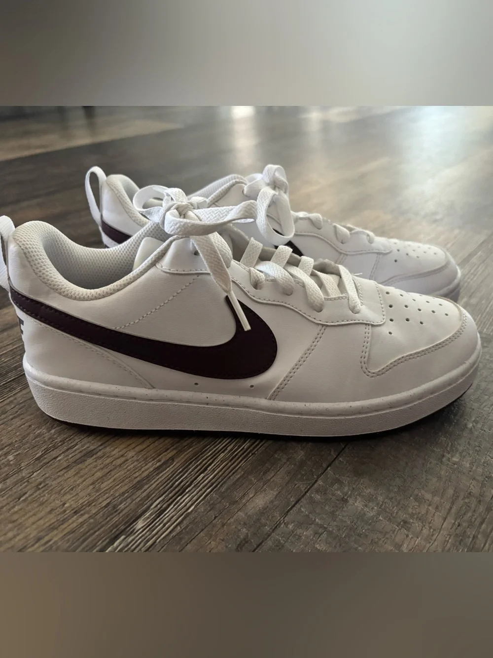 Nike White Low-Top Sneakers with Dark Burgundy Swoosh